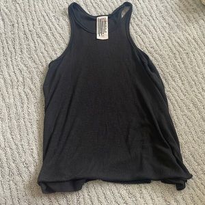 Free people black tank. Longer length. Perfect condition.